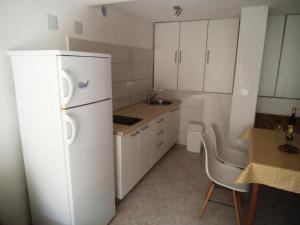 One-Bedroom Apartment with Terrace room in Apartments with a parking space Seget Vranjica Trogir - 11561