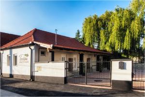 Toszkána Apartmanház