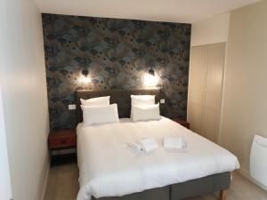 Appart'hotels Au Loup Historic Apartments : photos des chambres