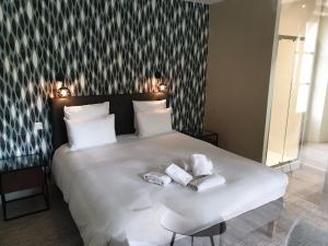 Appart'hotels Au Loup Historic Apartments : photos des chambres