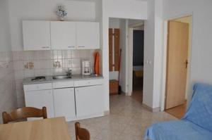 Two-Bedroom Apartment with Balcony room in Apartments with a parking space Lopar Rab - 16680