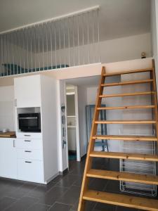 Appartements studio en plein centre ville a 8 minutes de l'ocean : photos des chambres