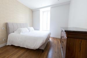 Appartements Tonnelier 33 - Charmant et Prestigieux : photos des chambres