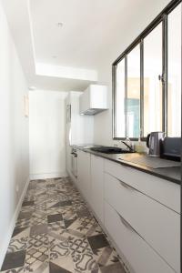 Appartements Tonnelier 33 - Charmant et Prestigieux : photos des chambres