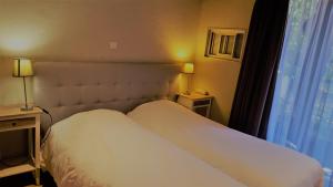 Hotels Logis Hotel - Restaurant Residence Les Cedres : photos des chambres