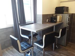 Appartements Centre-ville : photos des chambres