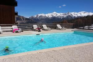 Appartements Le Skisud Cosy T3 Massif de Ecrins Puy St Vincent 1800 : photos des chambres