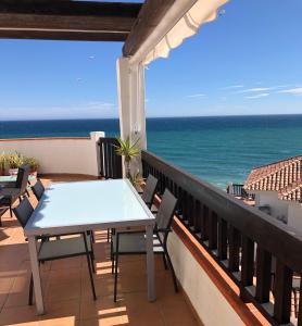 Beachfront Penthouse Apartment with Large Terrace and Breathtaking Sea Views close to Marbella Spain