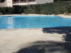 Appartements Bandol nature et loisirs: Parking/ Piscine : photos des chambres