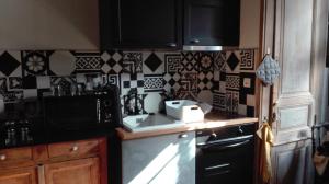 Appartements Les Petites Suites Dieppoises - L'Atelier Couture : photos des chambres