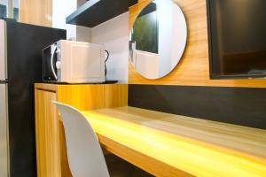 Modern and Comfy Studio Apartment No Kitchen Mustika Golf Residence By Travelio