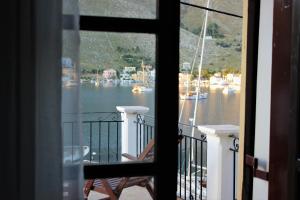 Gompos Apartment - Cozy Apartment next to the sea - Amazing Sea View Symi Greece