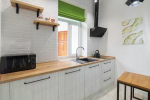 LEOGRAND Loft-studio on Husiak 8