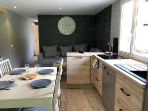 Appartements GITE L'OURSON : photos des chambres
