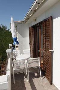 Two-Bedroom Apartment with Balcony and Sea View room in Apartments with a parking space Pag - 15442
