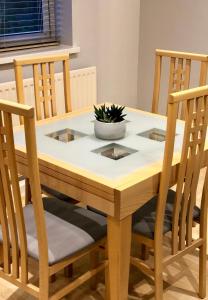 AB - Top floor 2 bed modern town centre apartment with parking for one vehicle