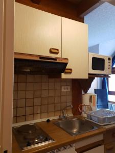 Appartements Studio chez le vigneron : photos des chambres