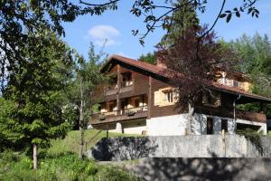 Chalets Sous les Ecotagnes : photos des chambres