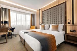 Twin Room - Non-Smoking room in Ramada by Wyndham Ramnicu Valcea