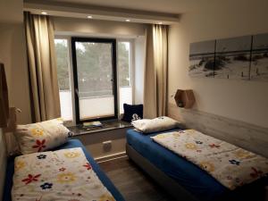 Ankerplatz am Südstrand, Fewo mit 2 Schlafzimmer und eigenen Strandkorb