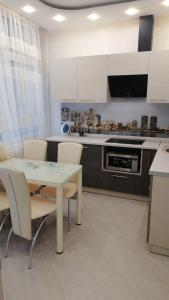 Апартаменты в Аркадии с террасой и прямым видом на море