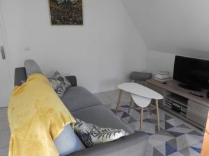 Appartements Au coeur des vignes : photos des chambres