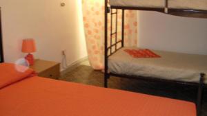 Camera Quadrupla con Bagno in Comune