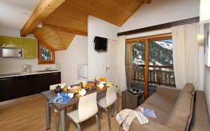 Hotels Residence Le Chalet de L'Eterlou by Popinns : photos des chambres