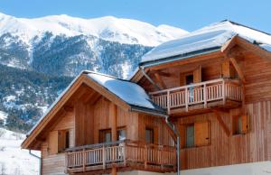 Hotels Residence Le Chalet de L'Eterlou by Popinns : photos des chambres