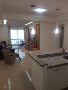 Ap pé na areia frente praia Costa do sol