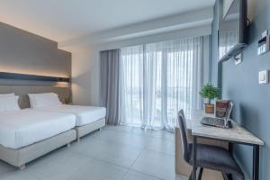 Interconnecting Quadruple Room room in Avra Hotel