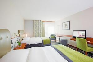 Classic Queen Room with Two Queen Beds room in Mövenpick Hotel Zurich Airport