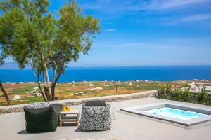 Luxury Cave Villa with Outdoor Hot Tub, Sea & Sunset View