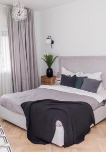 Explore the City from Its Center in a Chic Balcony Apartment