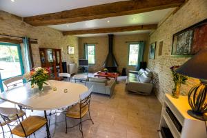 Maisons de vacances La Ferme de L'Oudon & SPA : photos des chambres