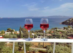 Vacation house with majestic blue sea and green mountain views Salamina Greece