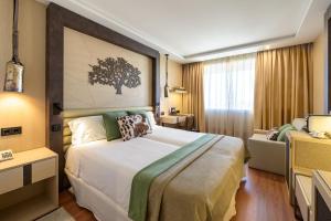 Deluxe Triple Room room in Santemar