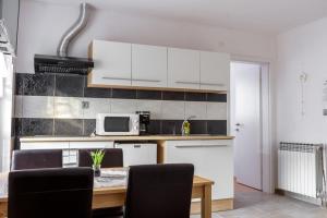 Apartmaji SLATENIK 