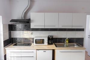Apartmaji SLATENIK 