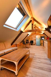 Appartements LOFT SOUS LES COMBLES - LOFT UNDER THE RAFTER : photos des chambres