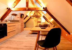 Appartements LOFT SOUS LES COMBLES - LOFT UNDER THE RAFTER : photos des chambres