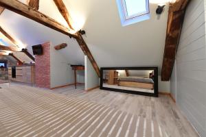 Appartements LOFT SOUS LES COMBLES - LOFT UNDER THE RAFTER : photos des chambres