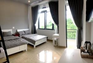 Phòng 4 Người Có Ban Công (Quadruple Room with Balcony)