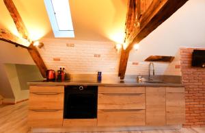 Appartements LOFT SOUS LES COMBLES - LOFT UNDER THE RAFTER : photos des chambres