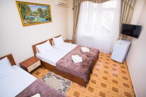 Standard Triple Room room in Eros Hotel