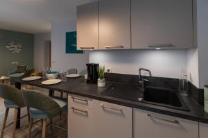 Appart'hotels Appartements des Marins : photos des chambres