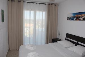 Appartements Residence Les Jardins De Lea : photos des chambres
