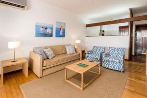 Three-Bedroom Apartment with Garden View room in Apartamentos Turisticos Pinhal Da Marina