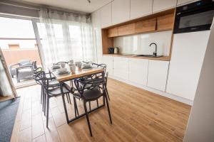 Apartamenty Bałtyckie - Sloneczna Oaza - Parking, Taras, Ogród, WIFI