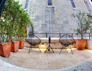 Double Room with Balcony (2 Adults + 1 Child) room in Guest House Forty-Four